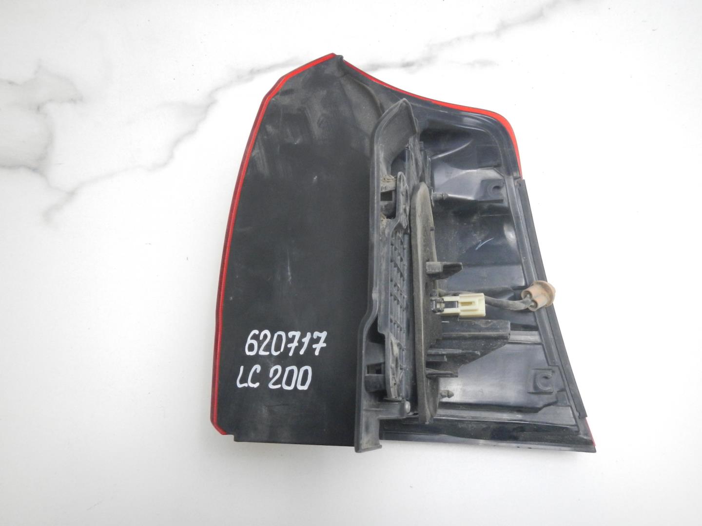 Фонарь задний левый