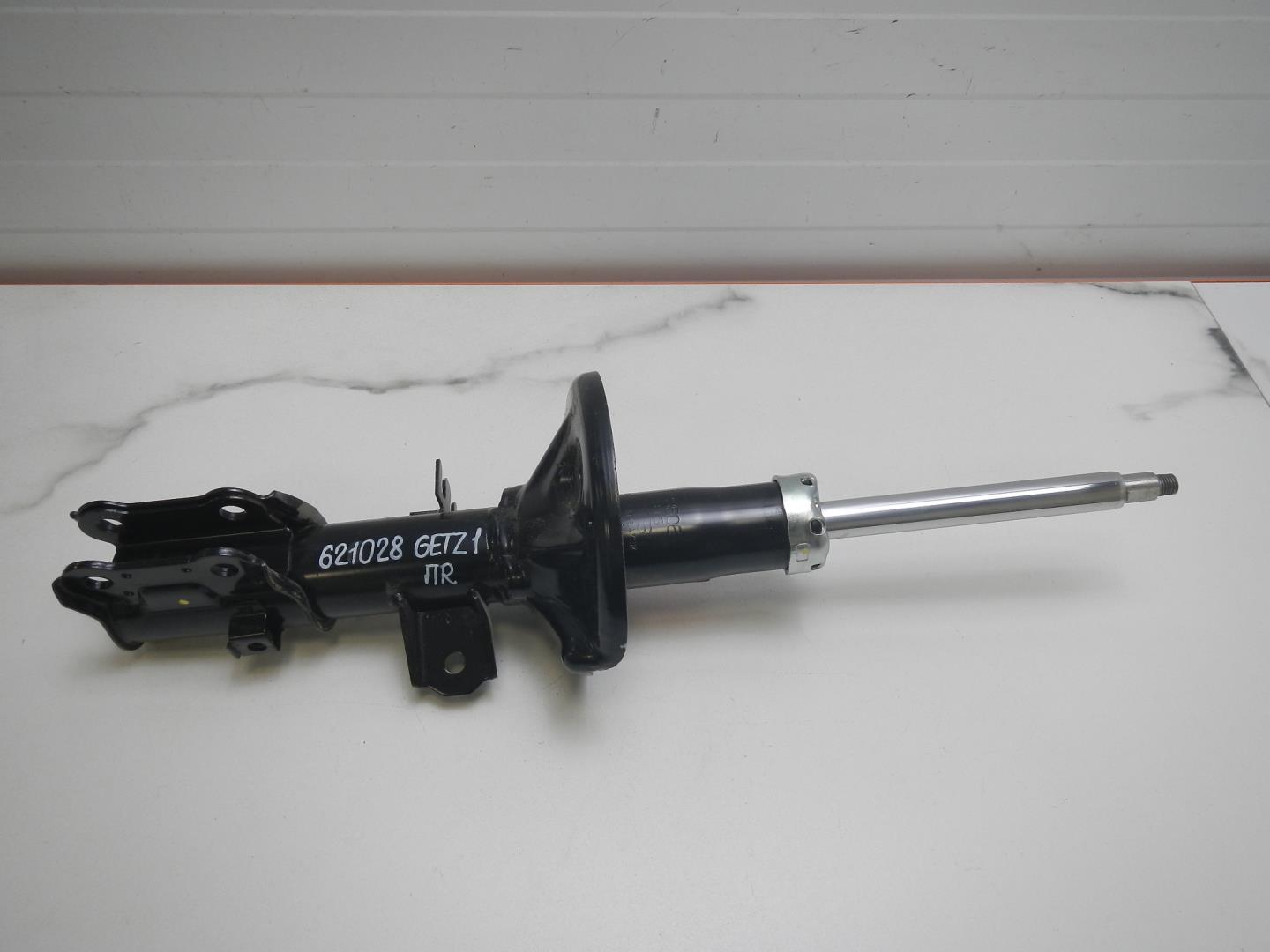 Амортизатор передний правый