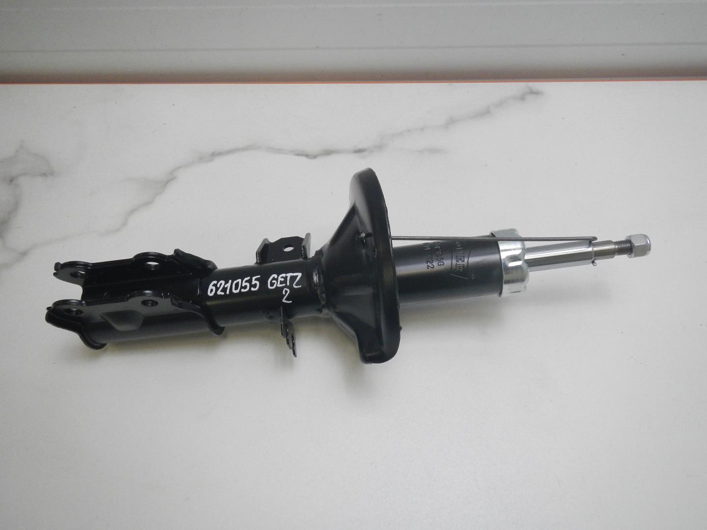 Амортизатор передний левый