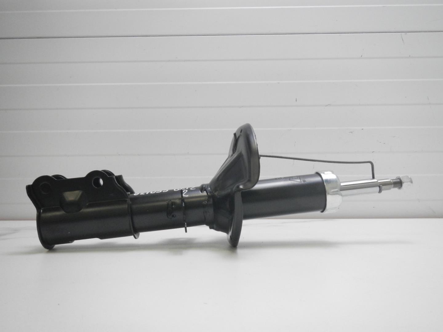 Амортизатор передний левый