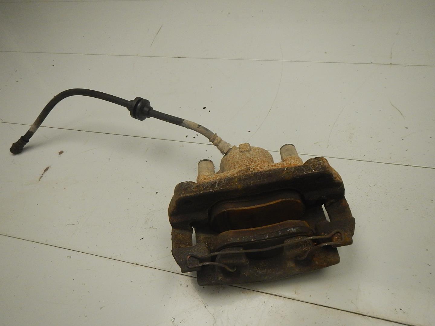 Суппорт передний левый