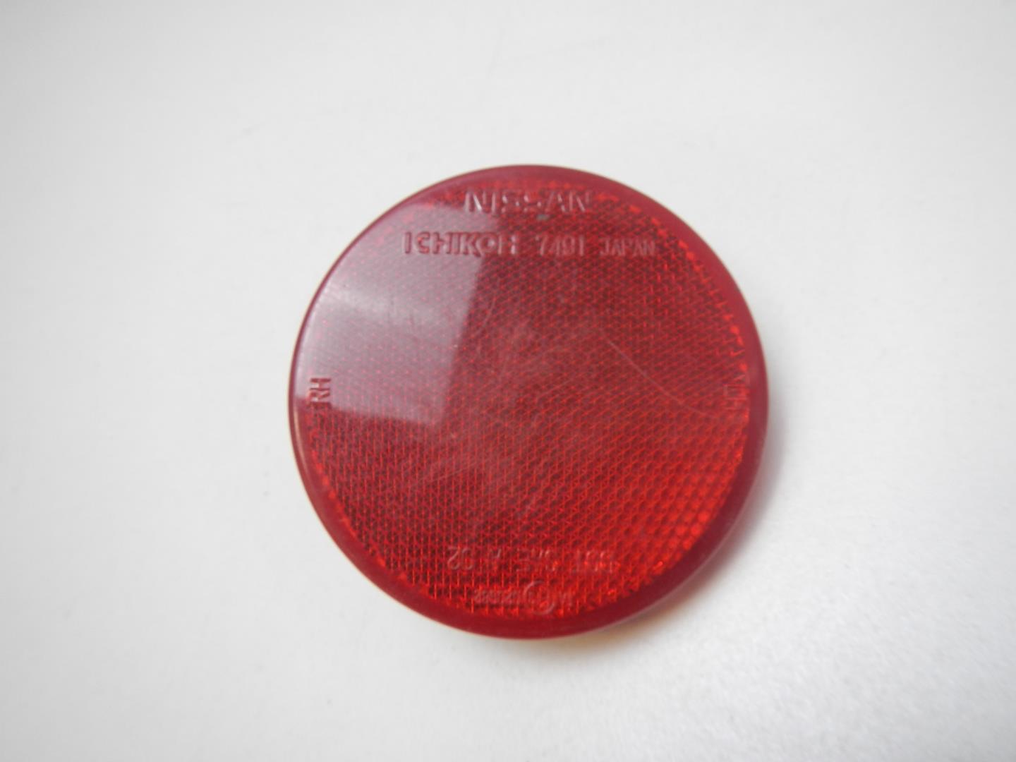 Отражатель в бампер задний левый