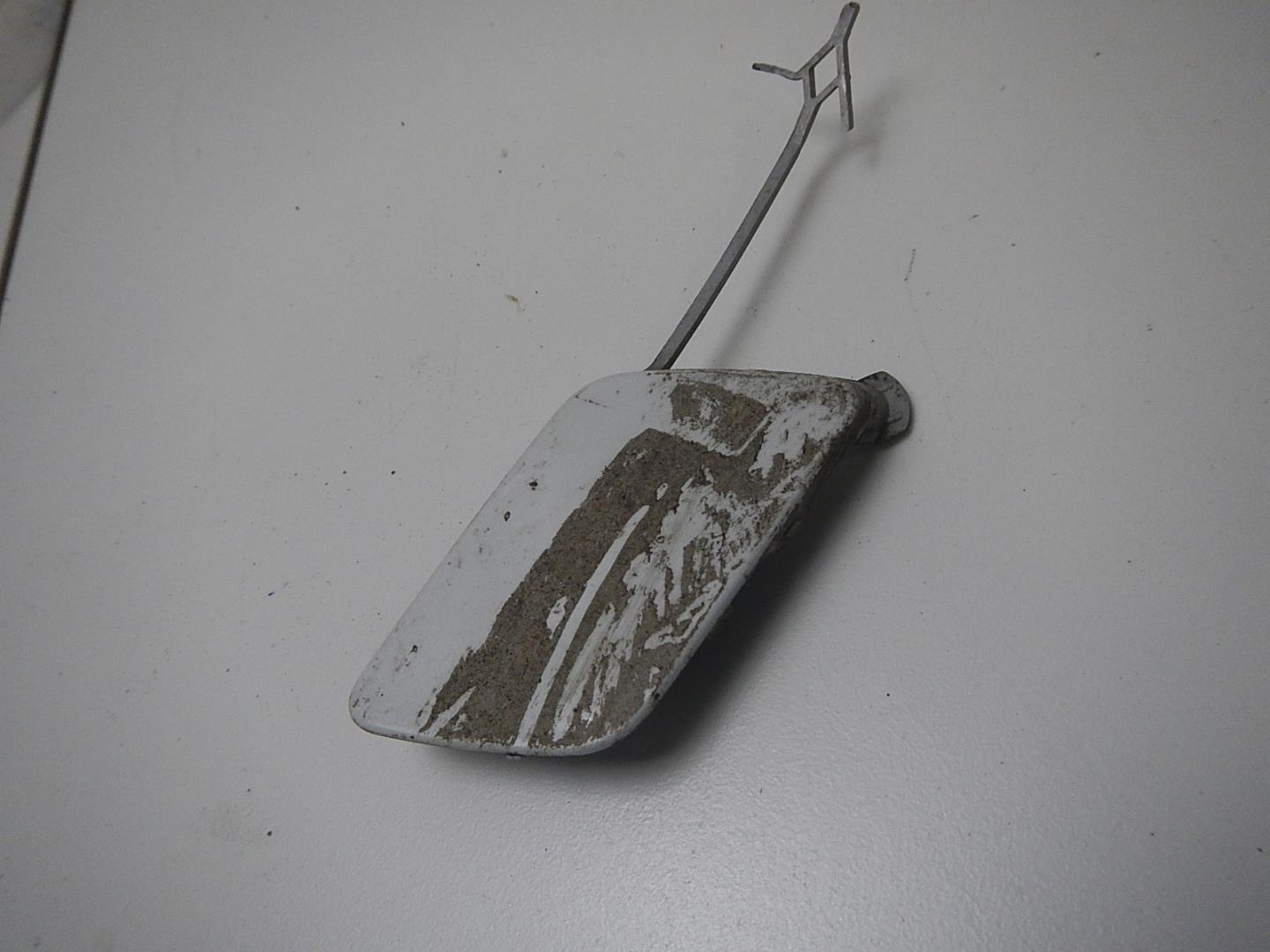 Заглушка буксировочного крюка