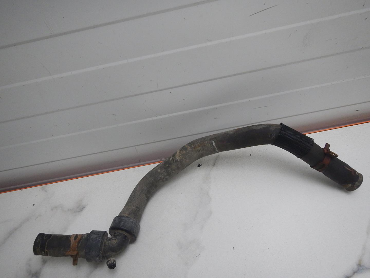 Патрубок отопителя