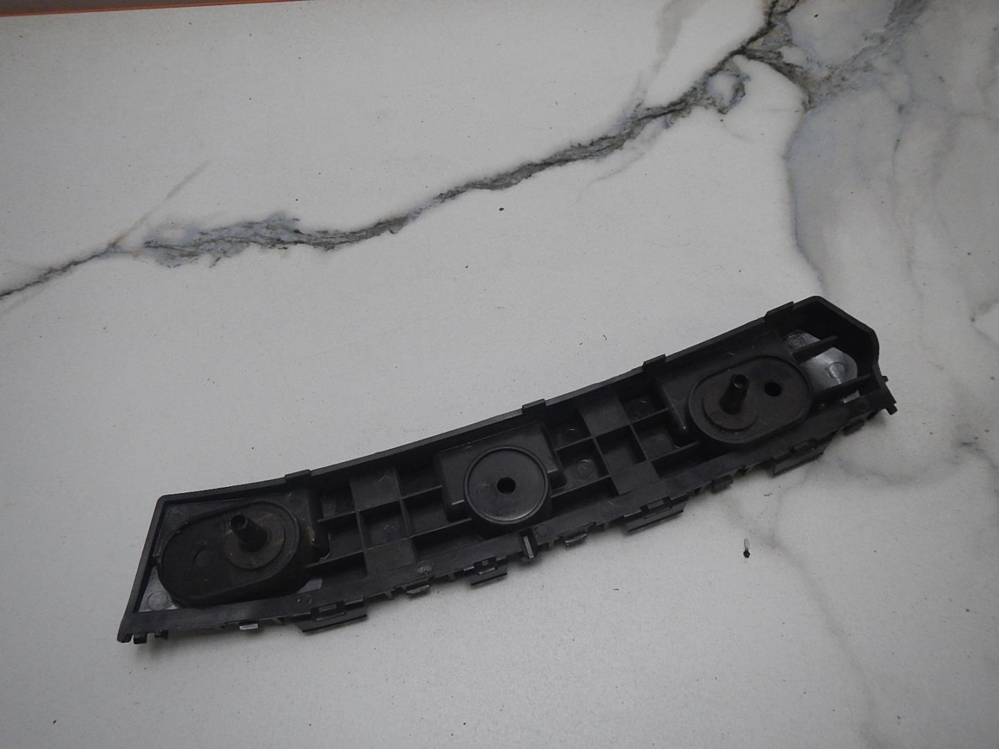 Кронштейн заднего бампера левый