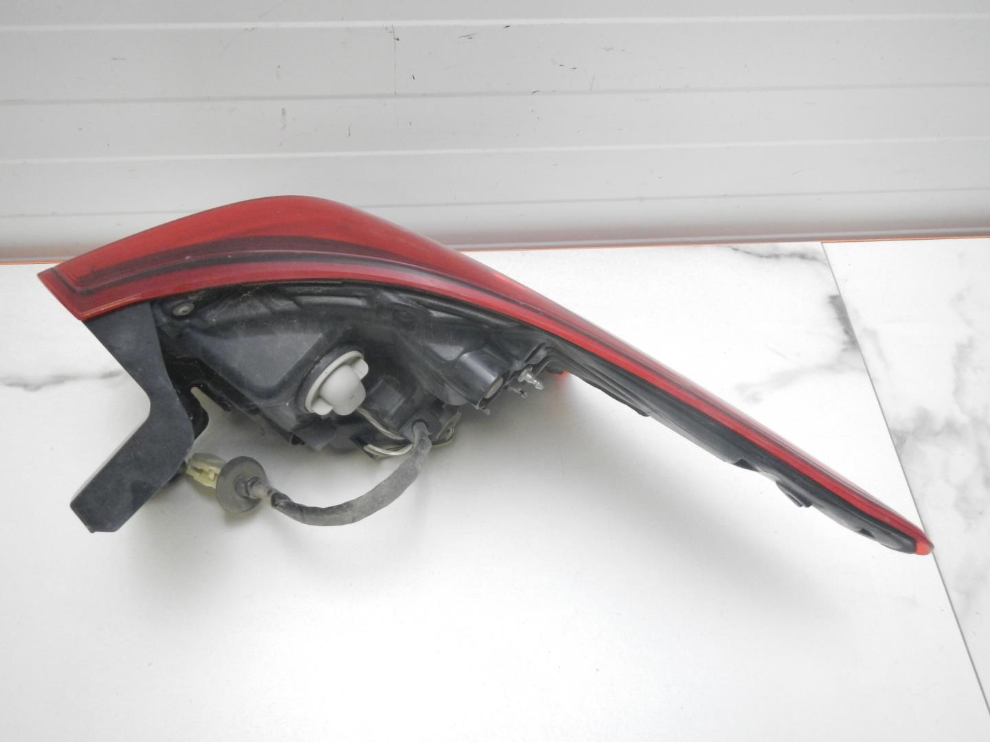 Фонарь задний левый