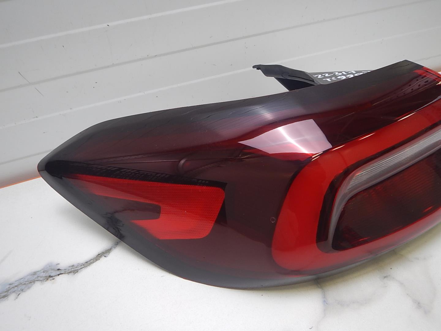 Фонарь задний левый