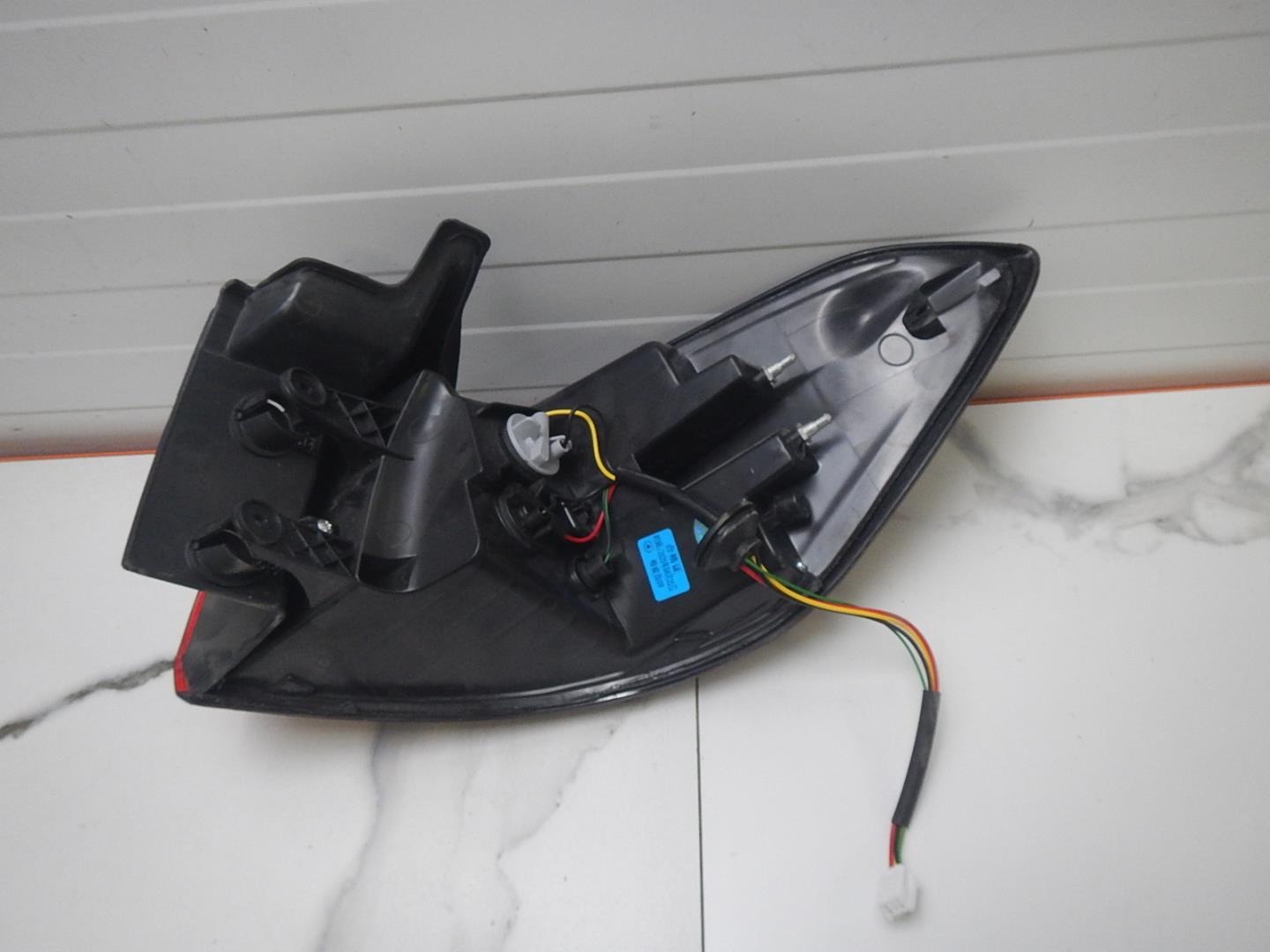 Фонарь задний левый