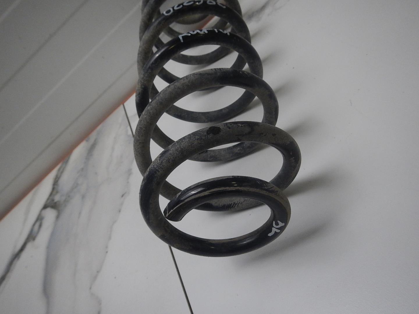 Пружина задняя