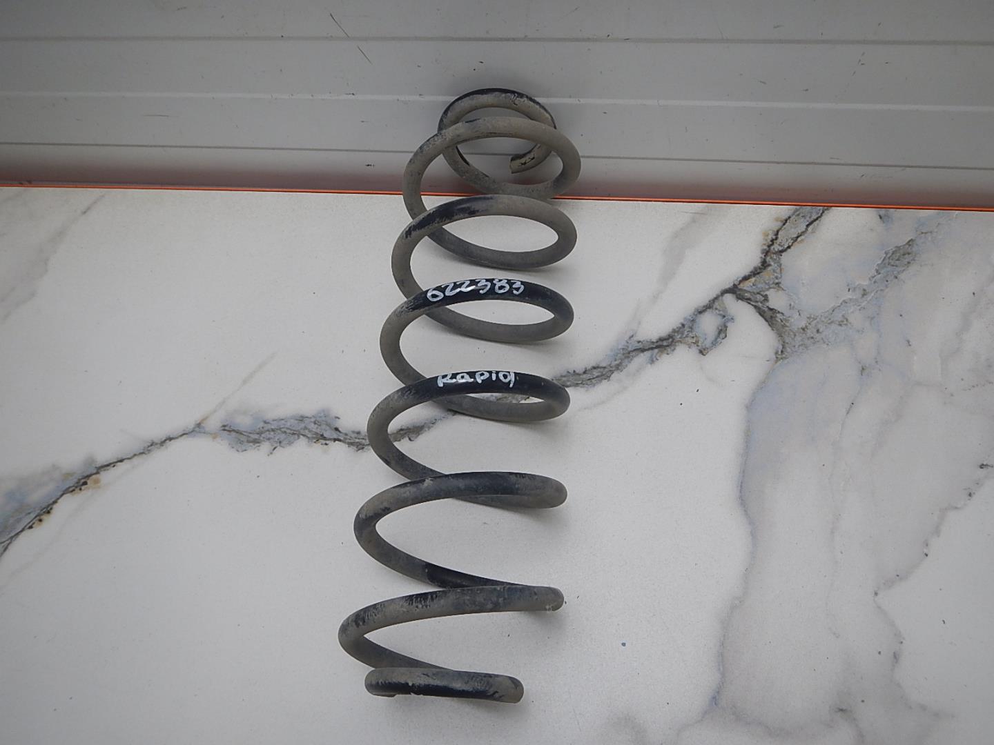 Пружина задняя