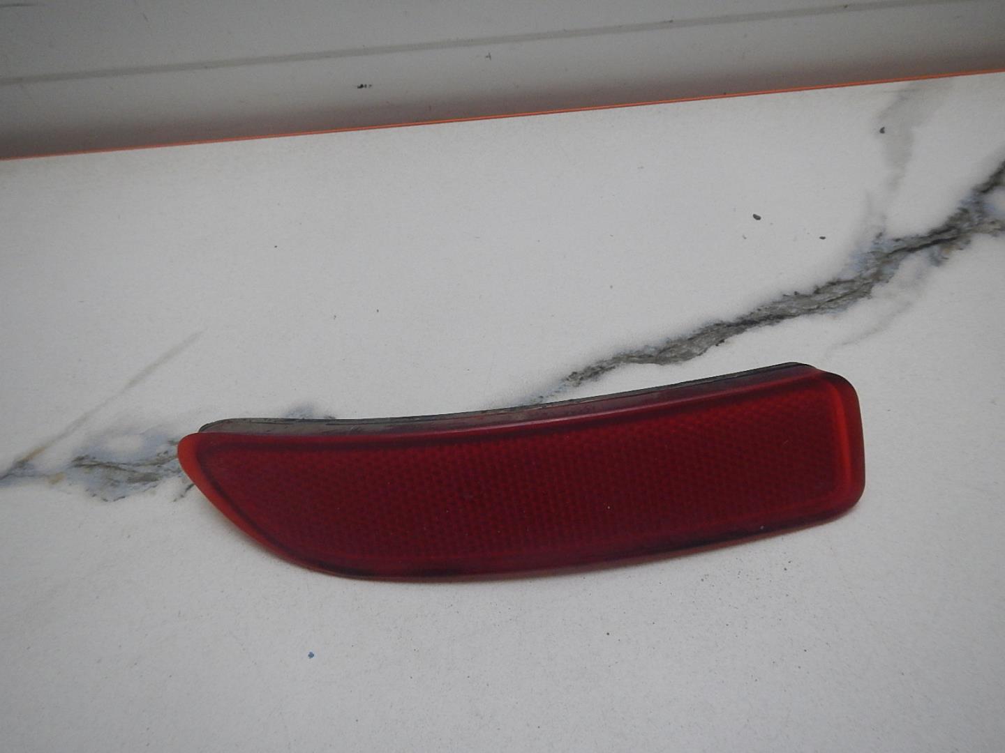 Отражатель в бампер задний правый