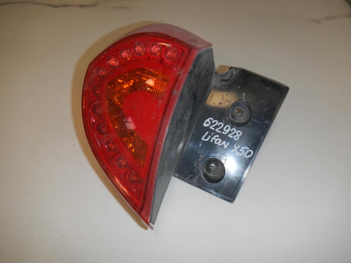 Фонарь задний левый