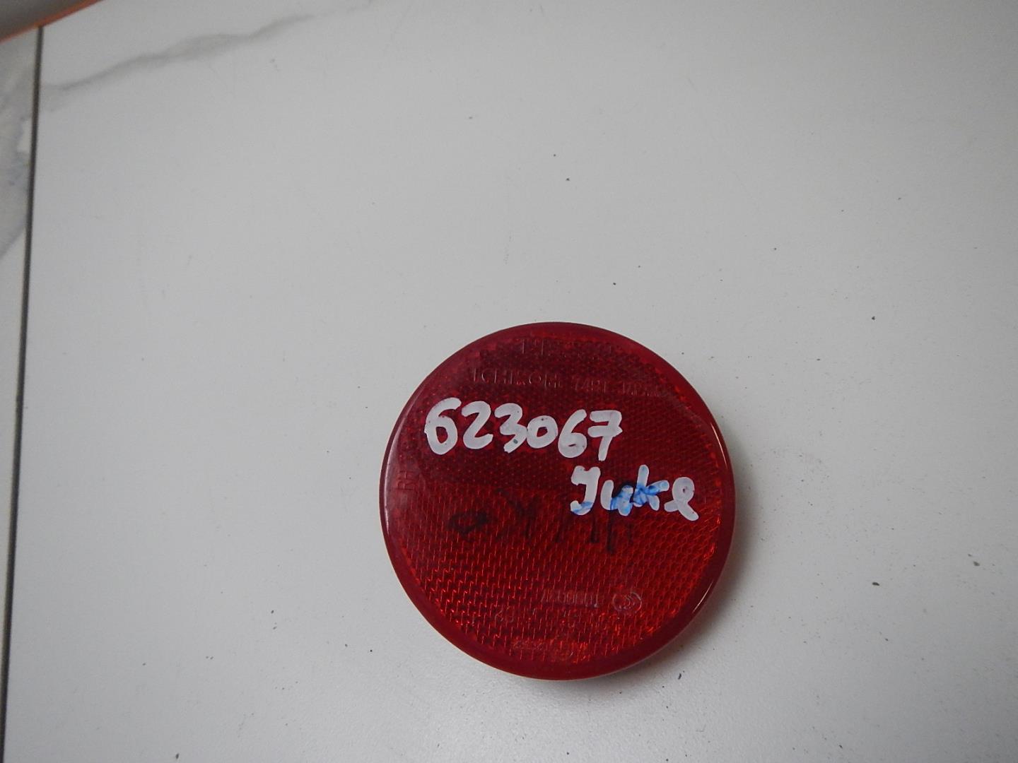 Отражатель в бампер задний левый