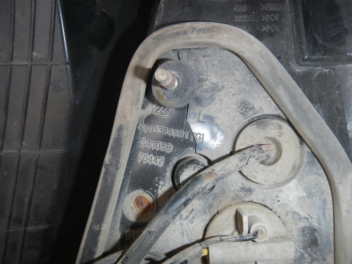 Фонарь задний левый