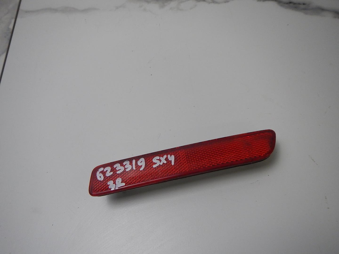 Отражатель в бампер задний правый