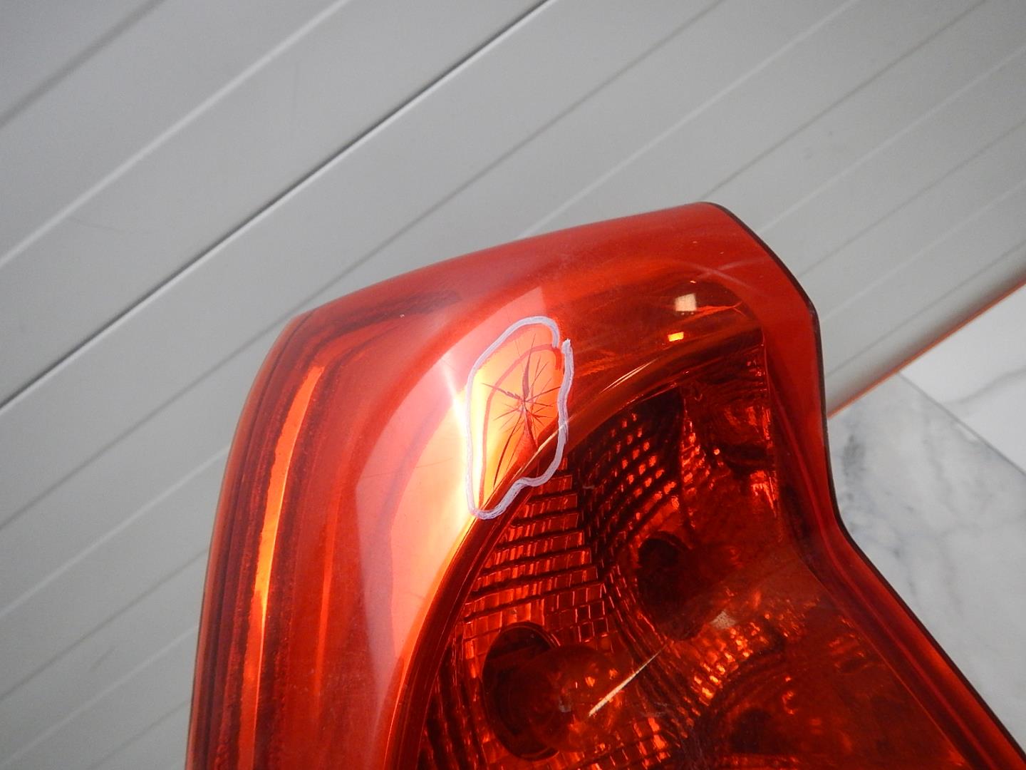 Фонарь задний левый