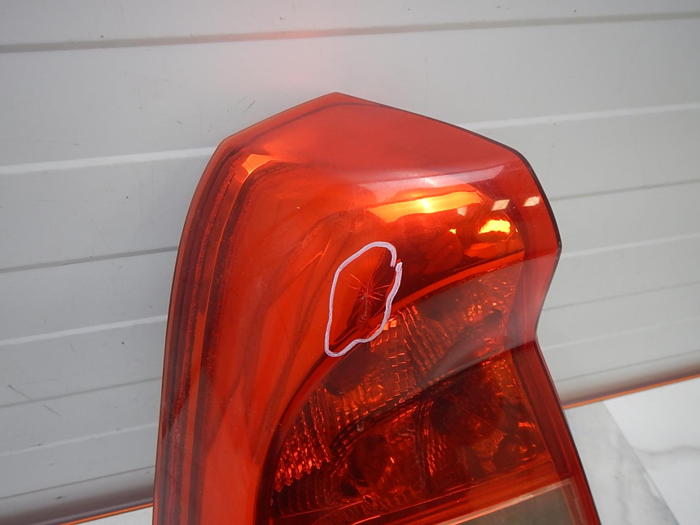 Фонарь задний левый