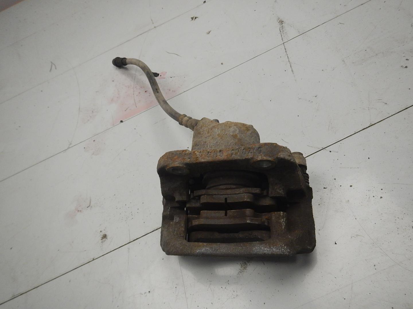 Суппорт передний левый