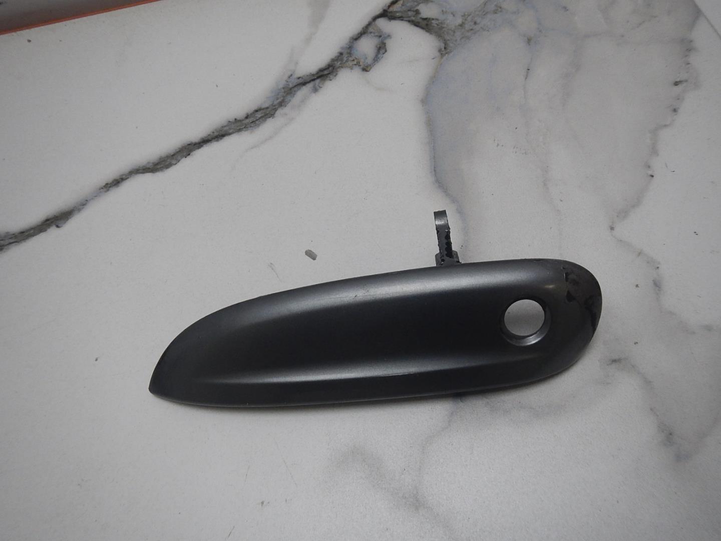 Ручка двери передней наружная левая