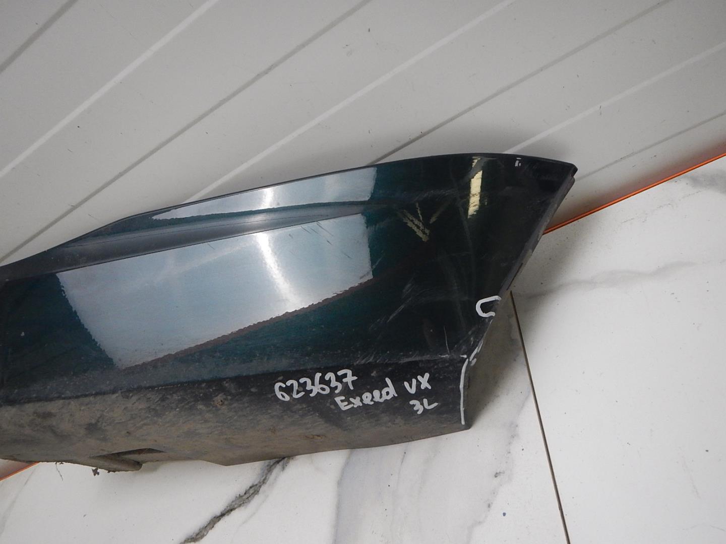 Накладка заднего бампера левая