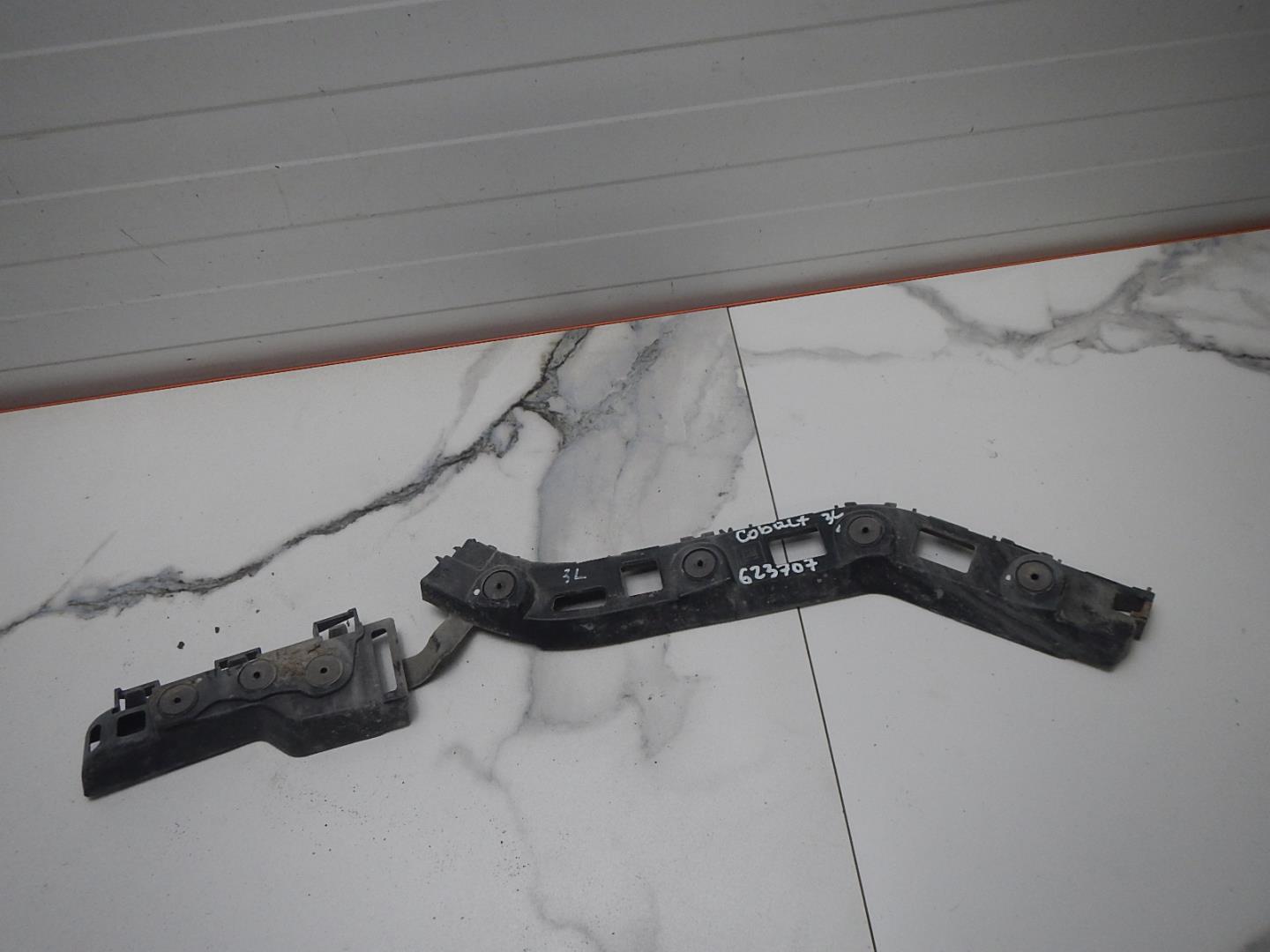 Кронштейн заднего бампера левый