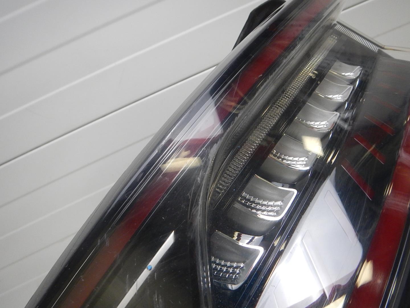 Фонарь задний левый