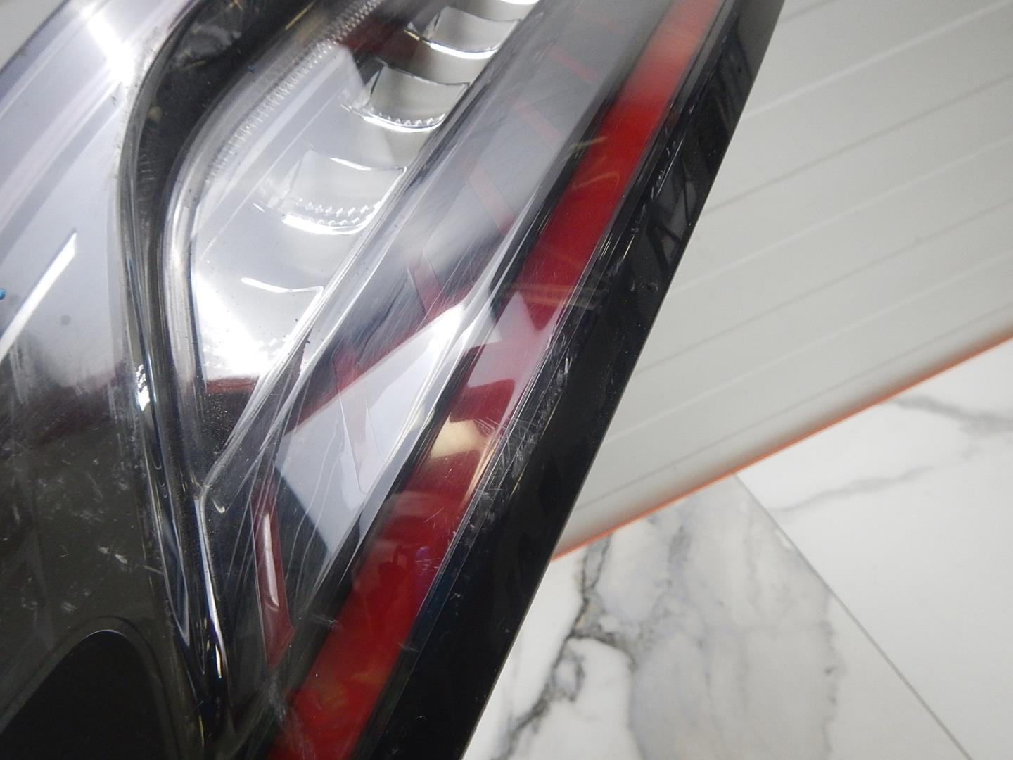 Фонарь задний левый