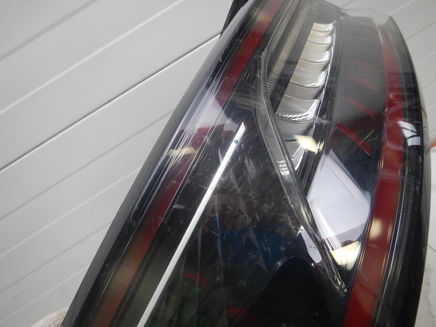 Фонарь задний левый