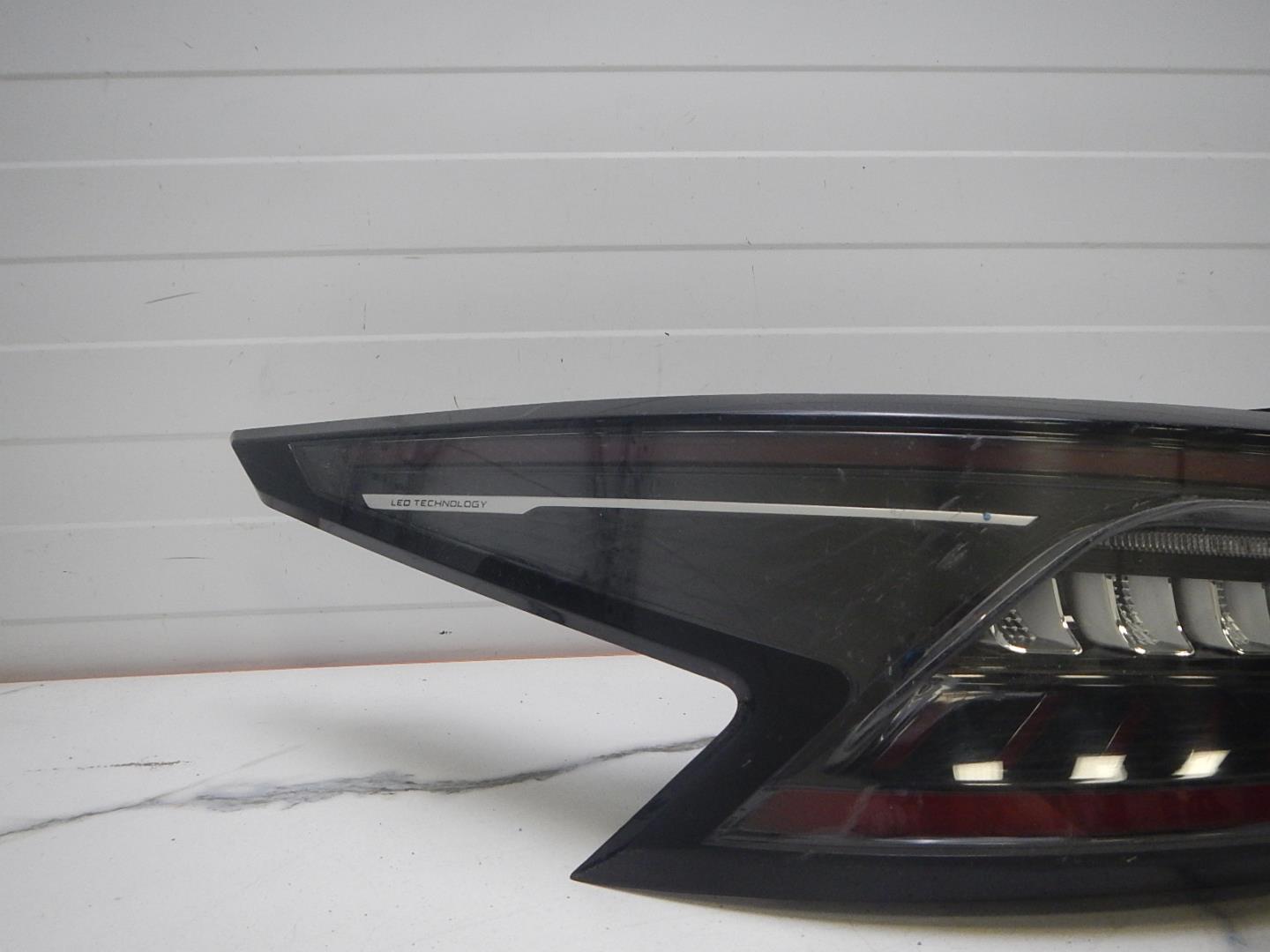 Фонарь задний левый