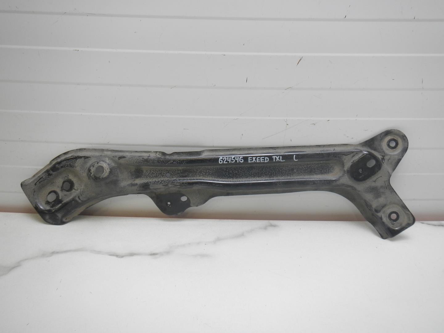 Кронштейн фар левый