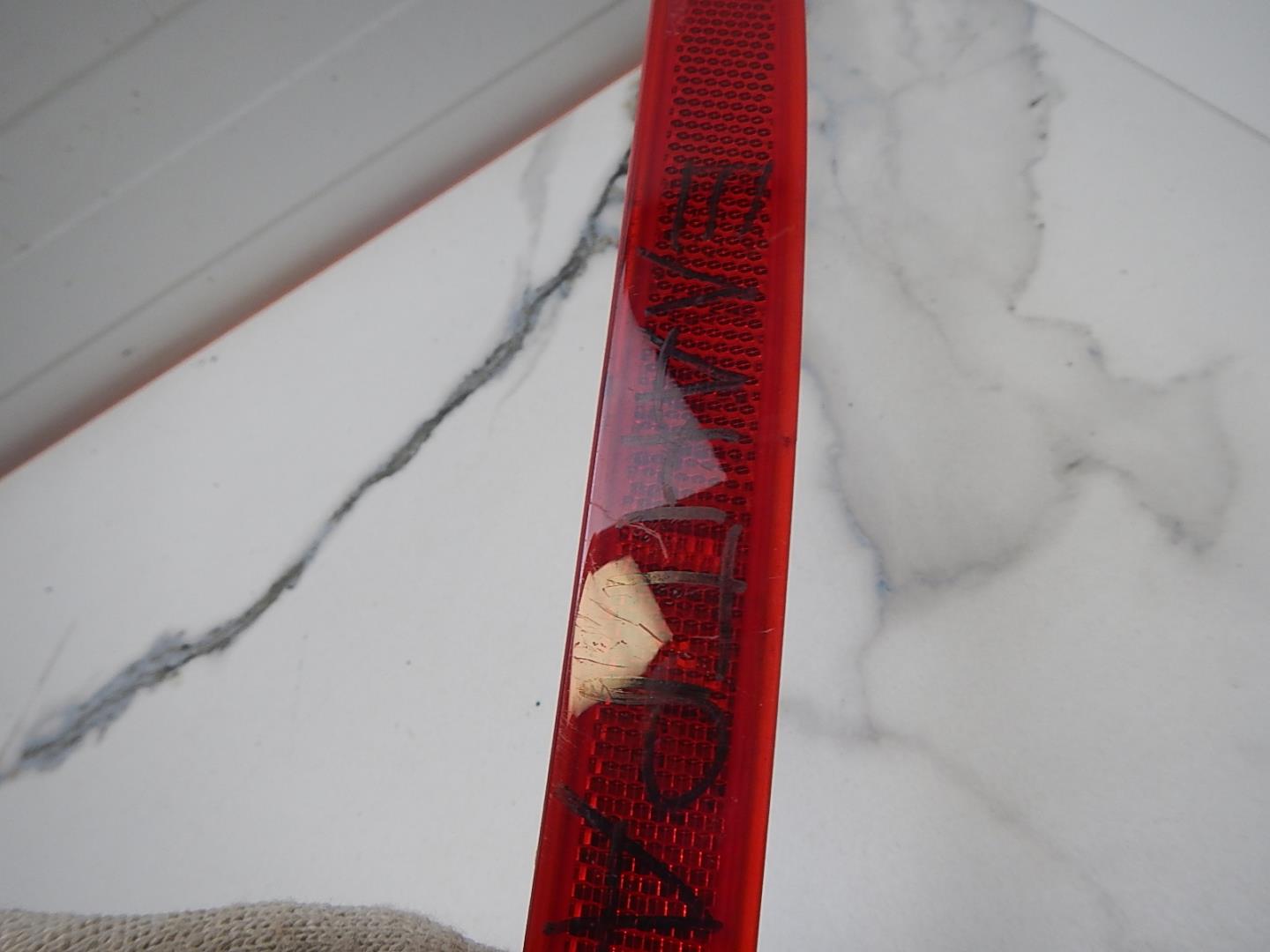 Отражатель в бампер задний левый