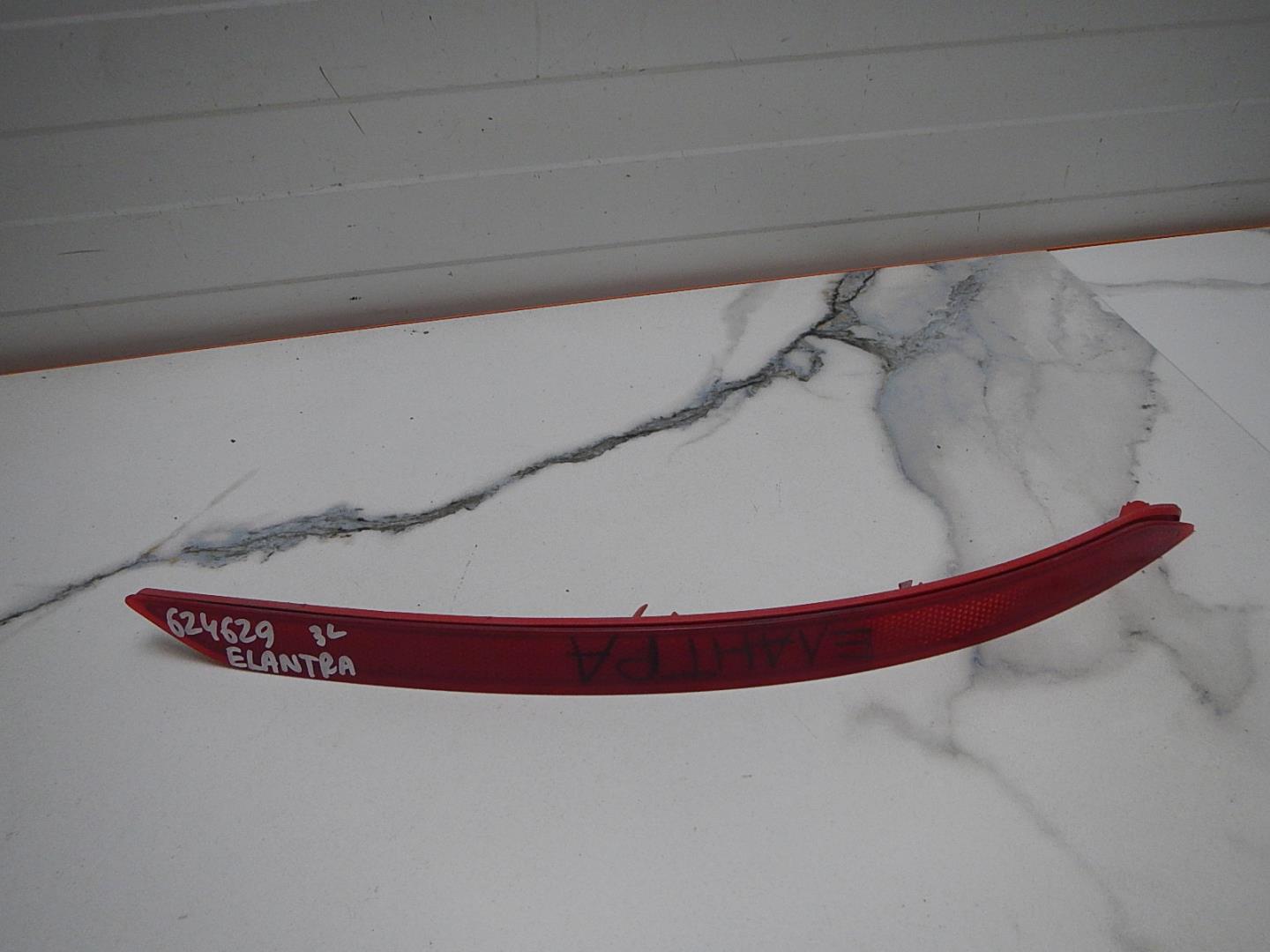 Отражатель в бампер задний левый