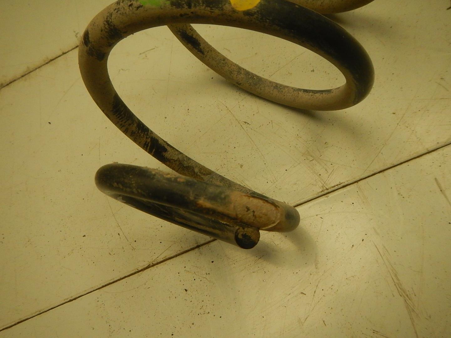 Пружина задняя