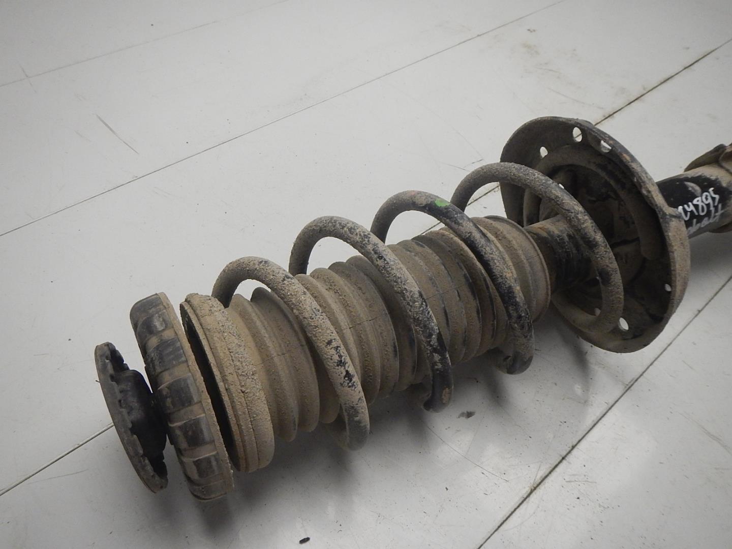 Амортизатор передний левый