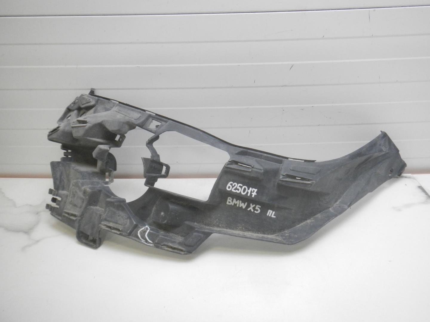 Кронштейн переднего бампера левый