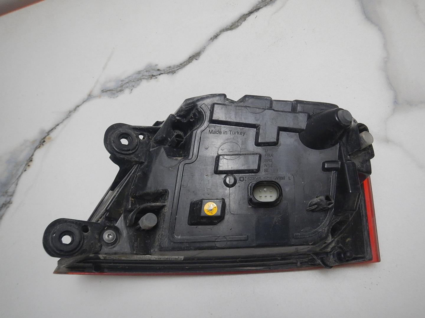 Фонарь задний левый