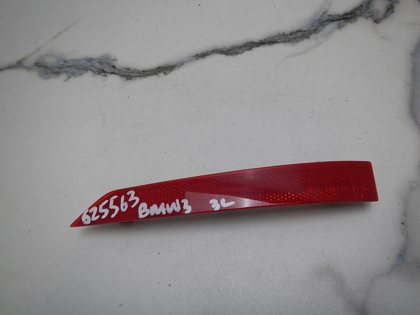 Отражатель в бампер задний левый