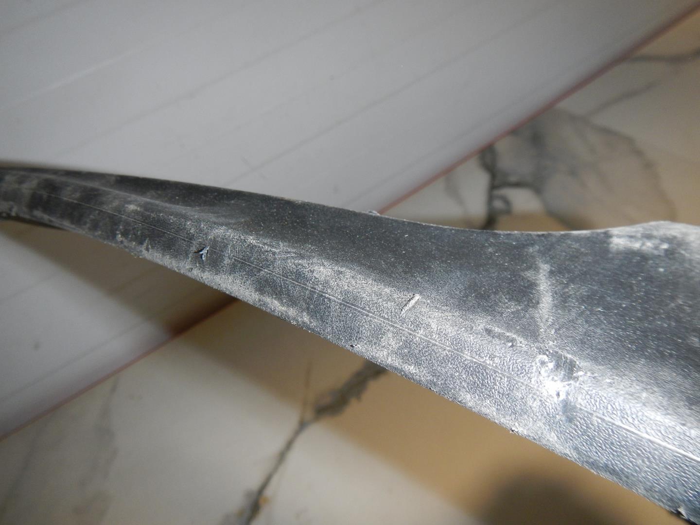 Брызговик передний левый