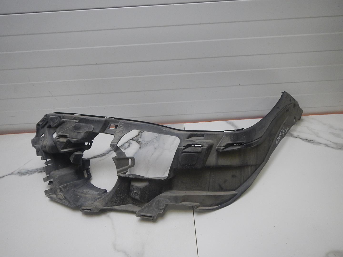 Кронштейн переднего бампера левый