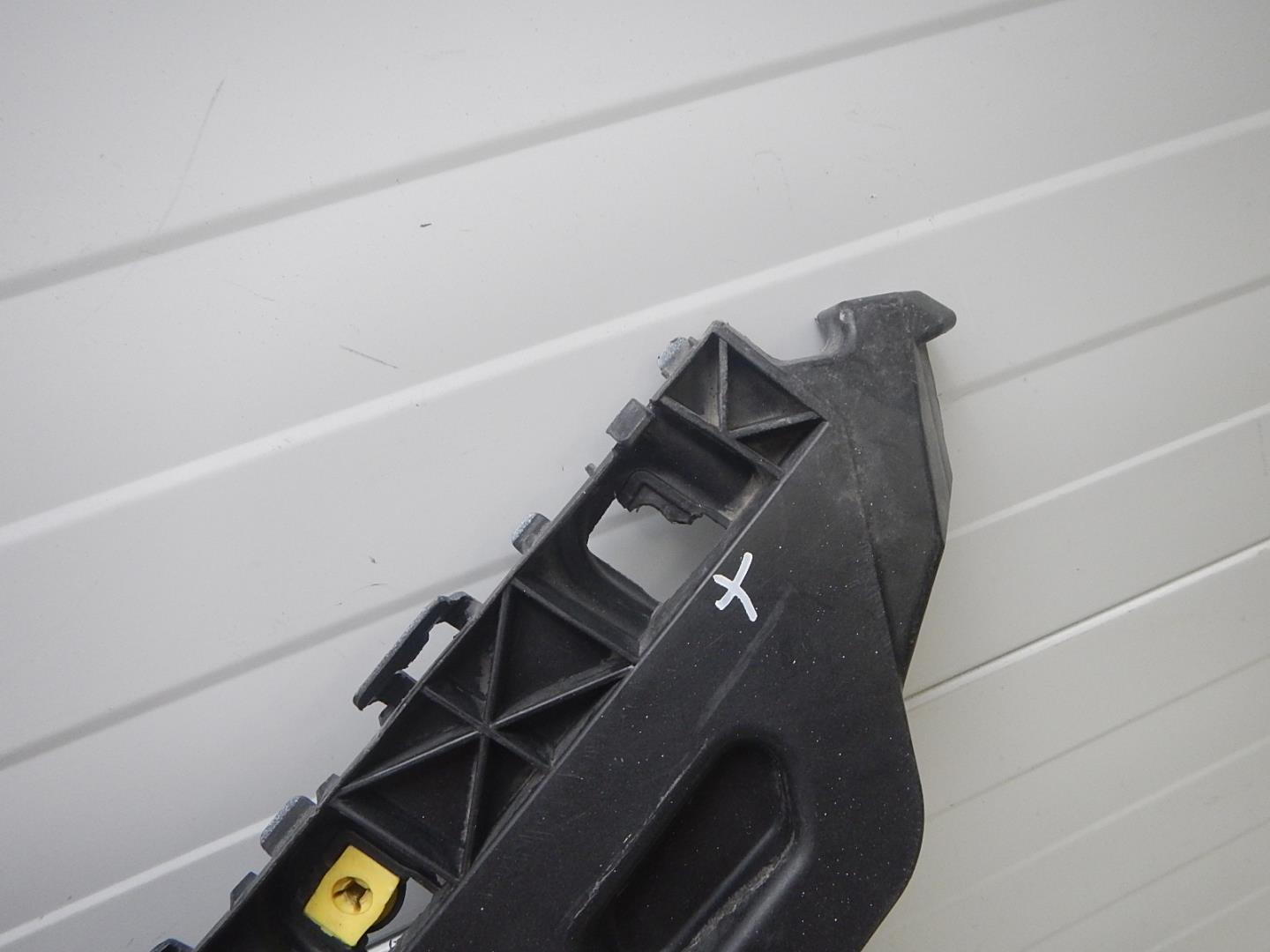 Кронштейн заднего бампера левый