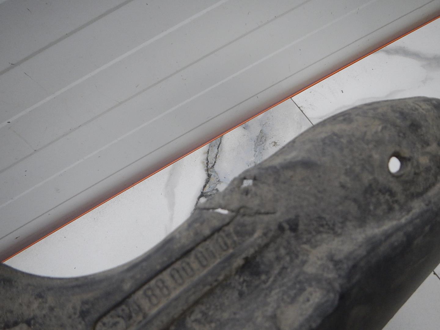 Брызговик передний левый