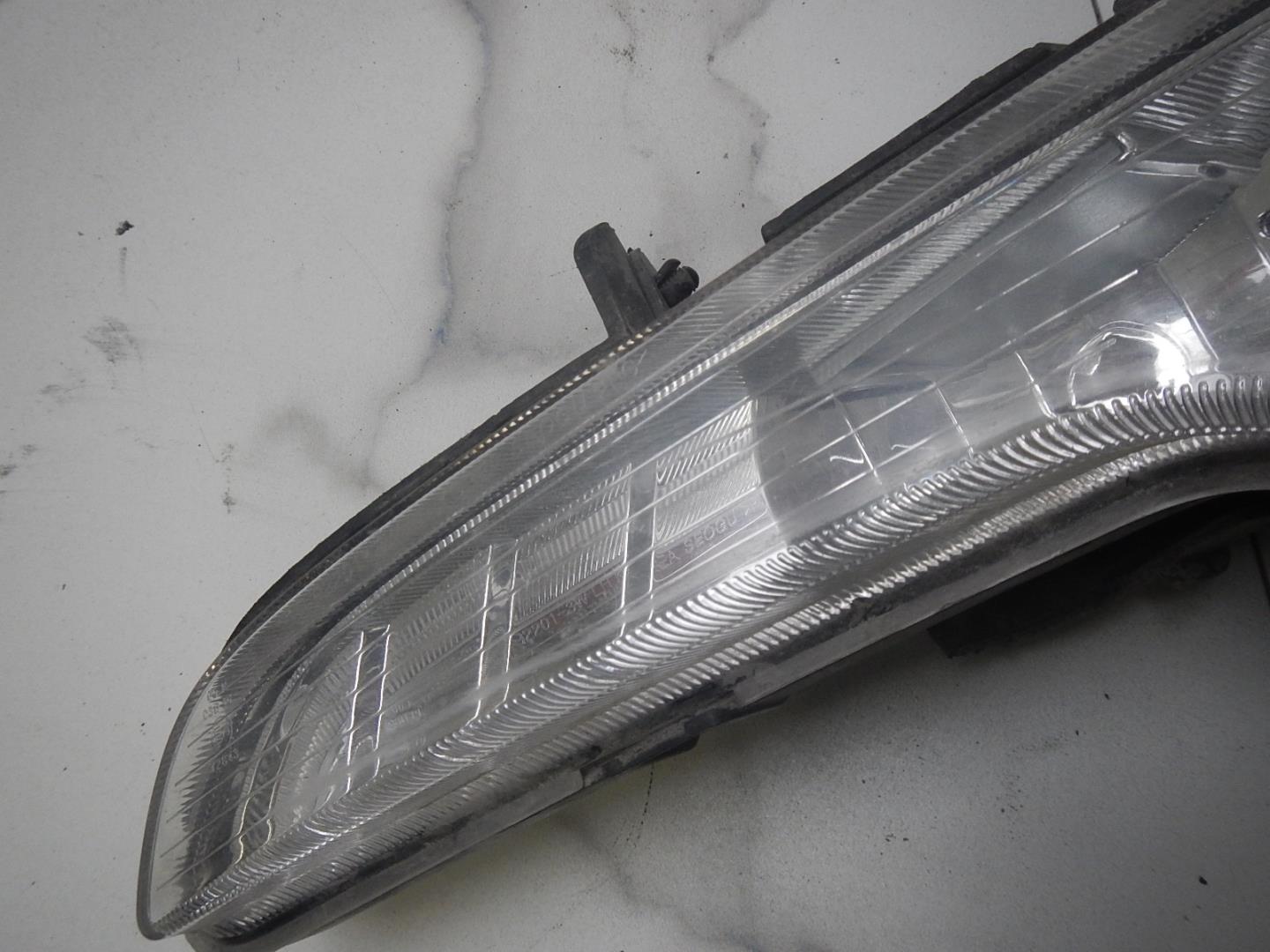 Фара противотуманная левая