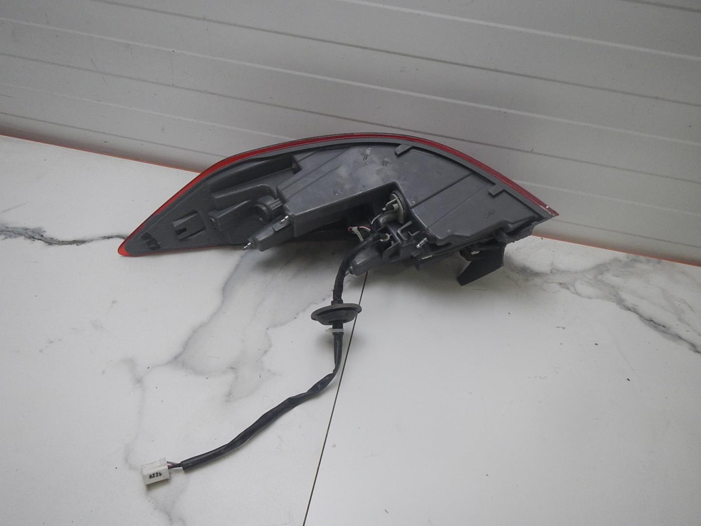 Фонарь задний левый