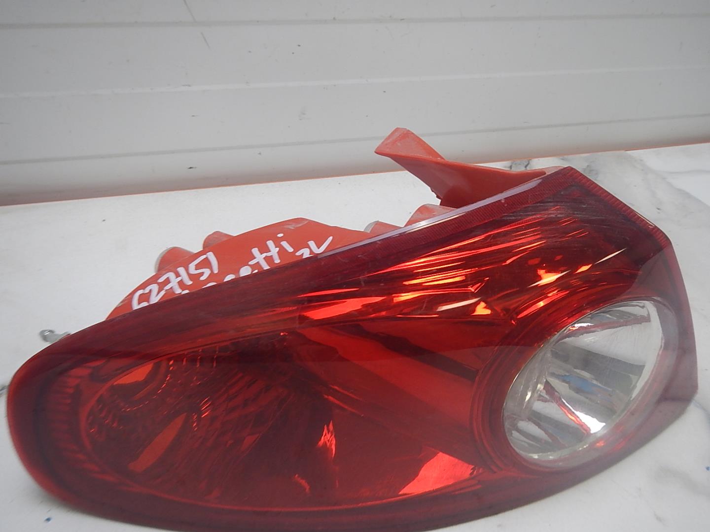 Фонарь задний левый