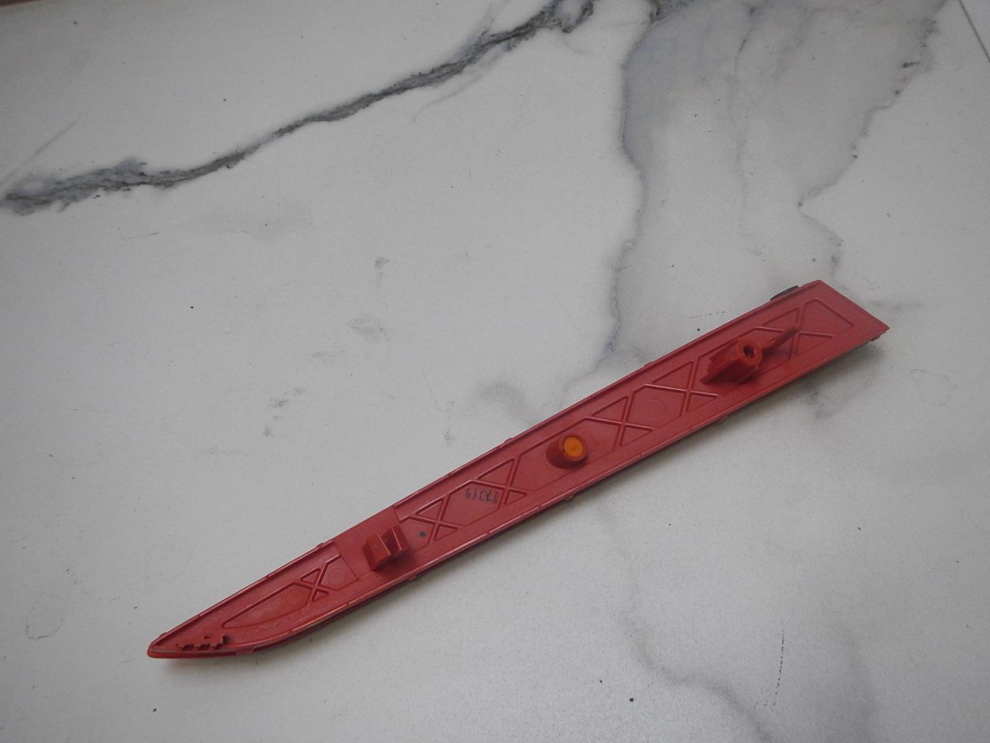 Отражатель в бампер задний левый