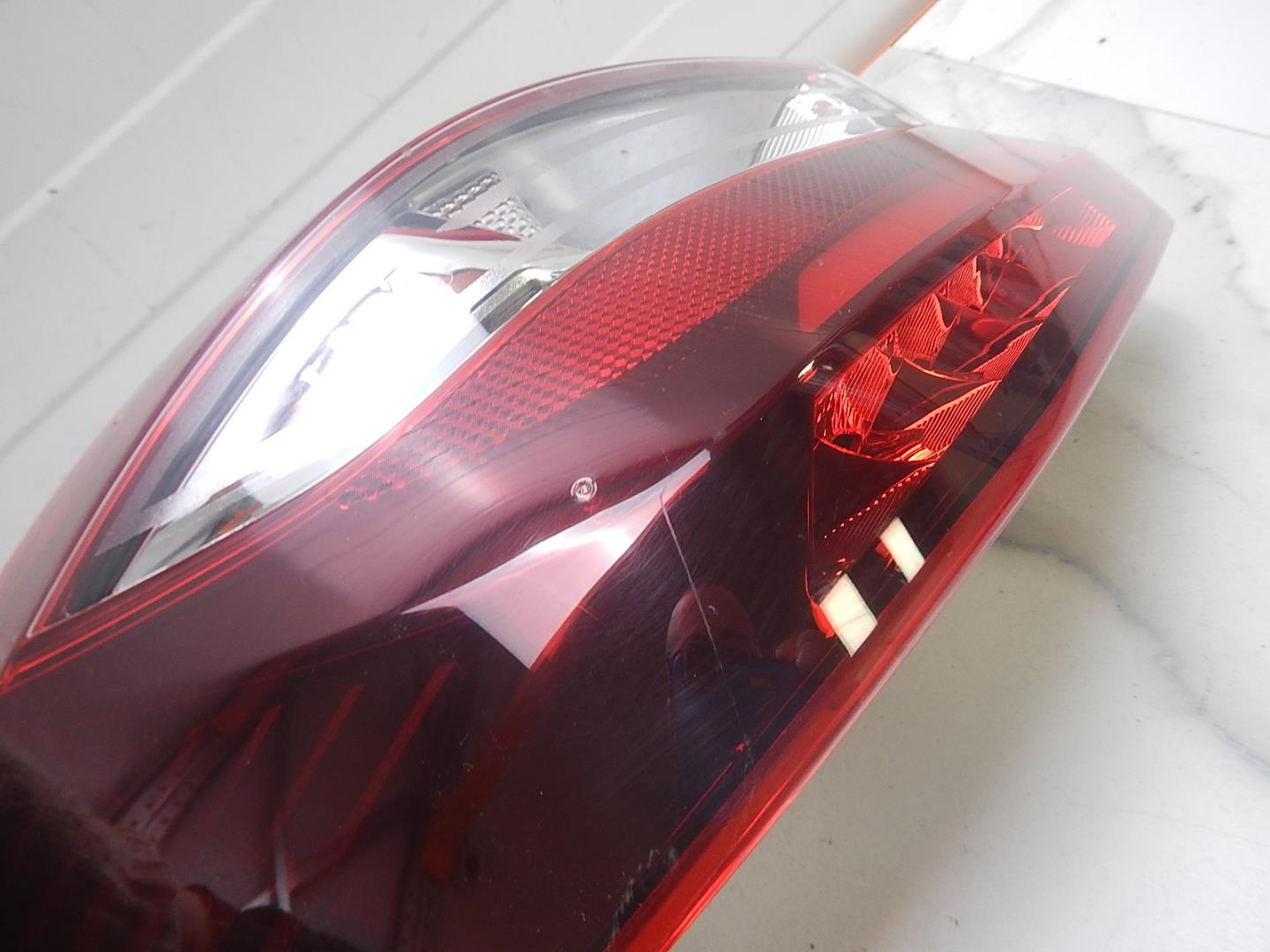 Фонарь задний левый