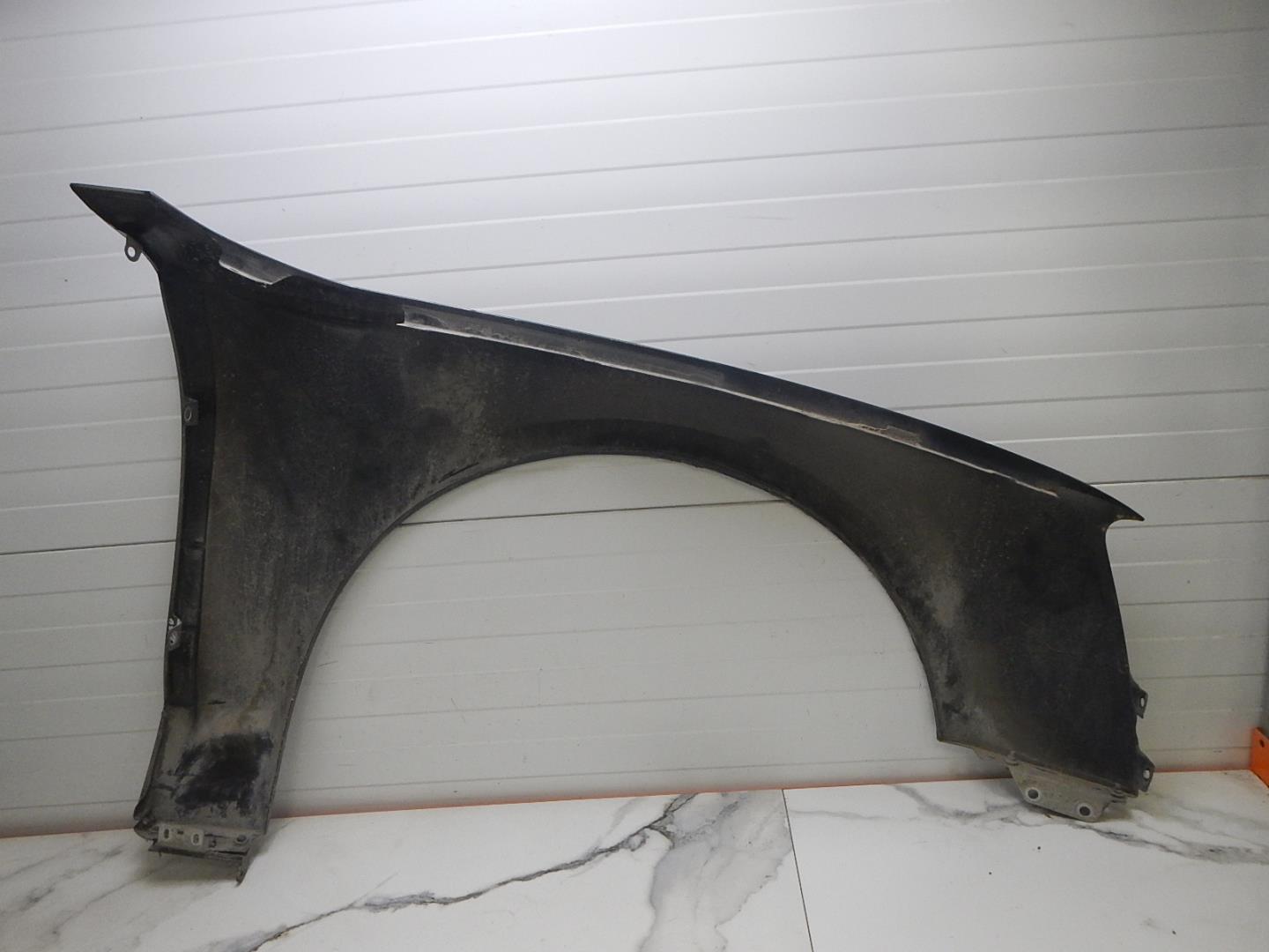 Крыло переднее левое