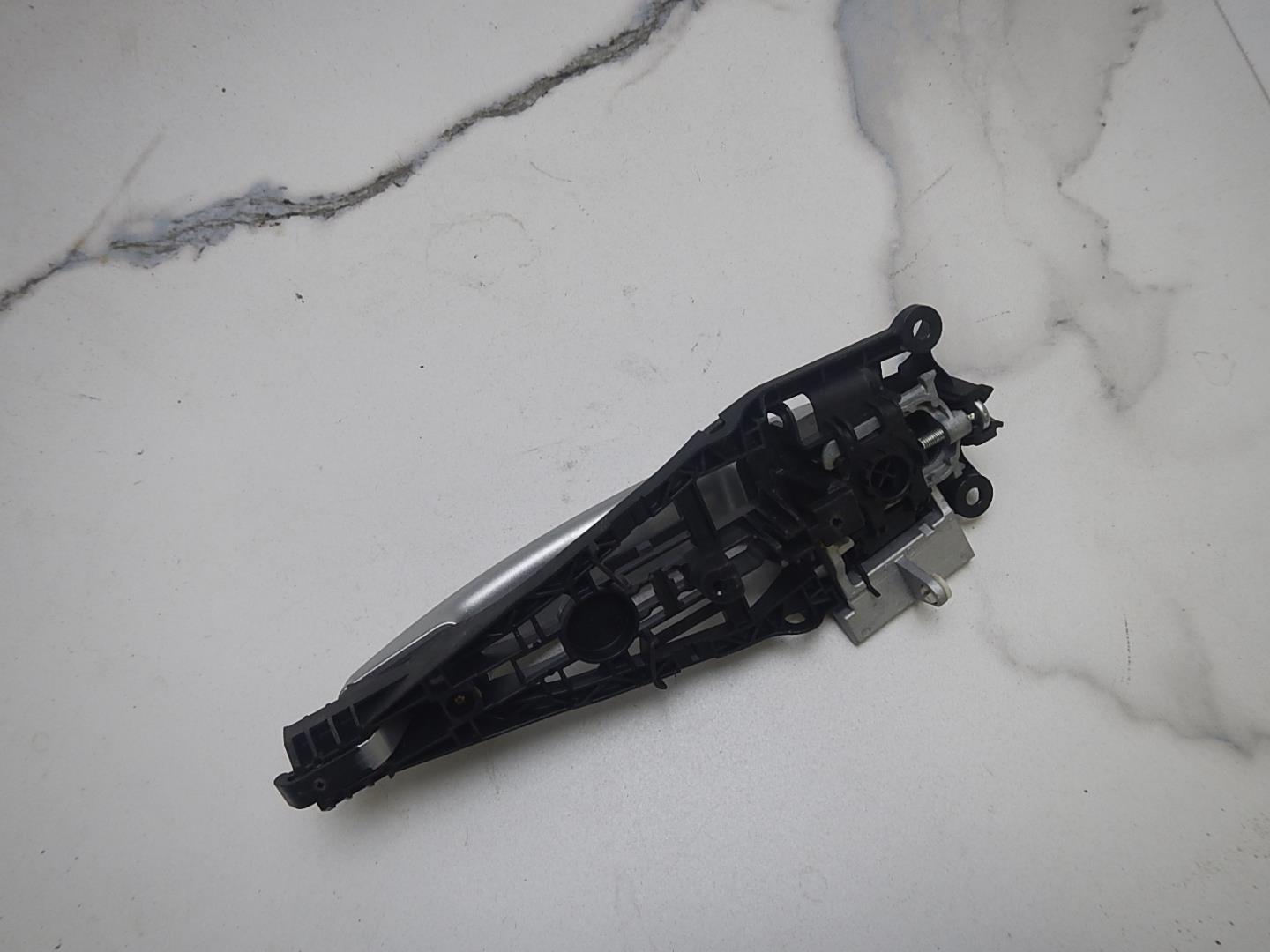 Ручка двери передней наружная левая