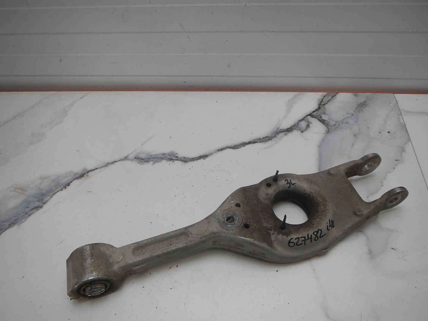 Рычаг задний нижний левый