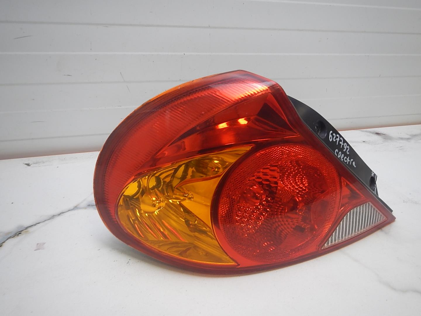 Фонарь задний левый